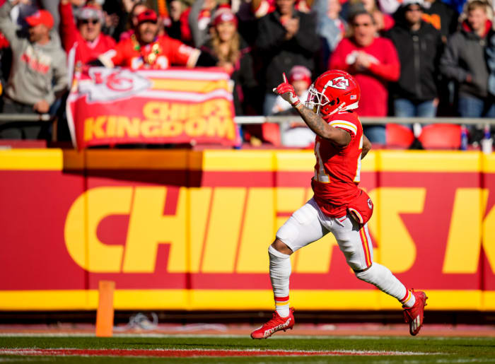 Dec 12, 2021; Kansas City, Missouri, USA; Kansas City Chiefs cornerback Mike Hughes (21) returns a fumble for a touchdown during the first quarter against the Las Vegas Raiders at GEHA Field at Arrowhead Stadium. Mandatory Credit: Jay Biggerstaff-USA TODAY Sports